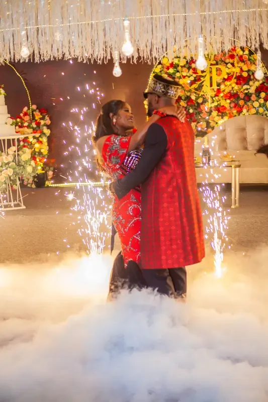 Couple sharing their first dance amid cold-spark fountains